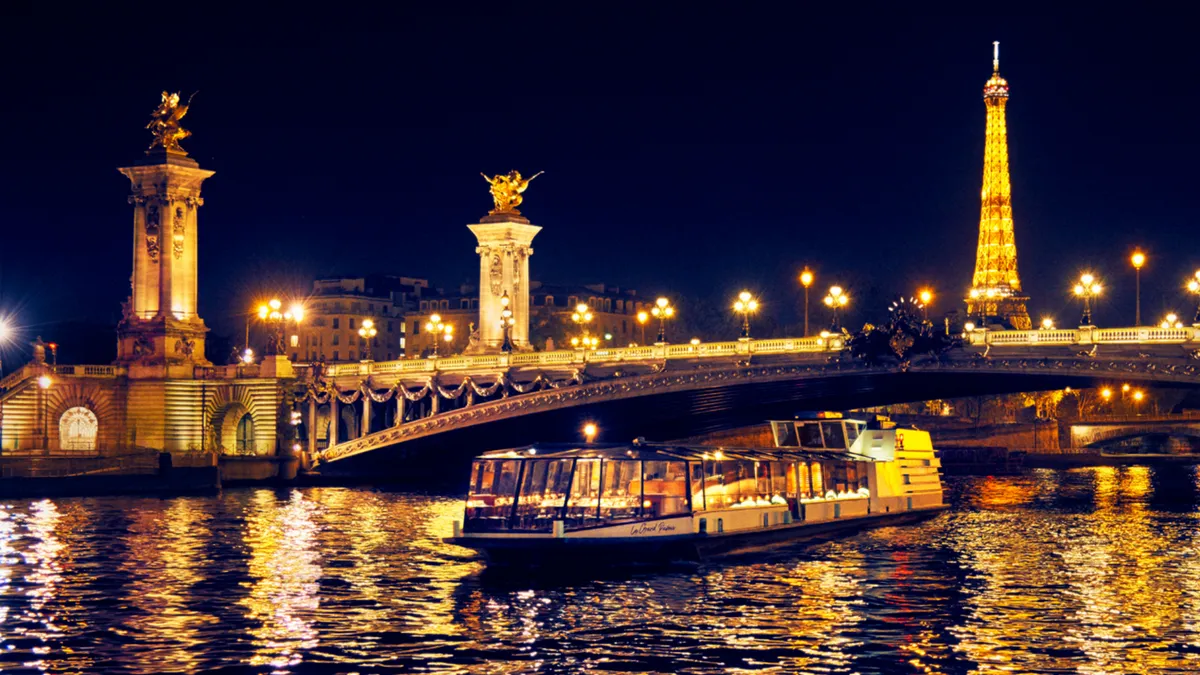 Delight in an exquisite lunch or dinner at your exclusive table, amidst iconic Parisian landmarks