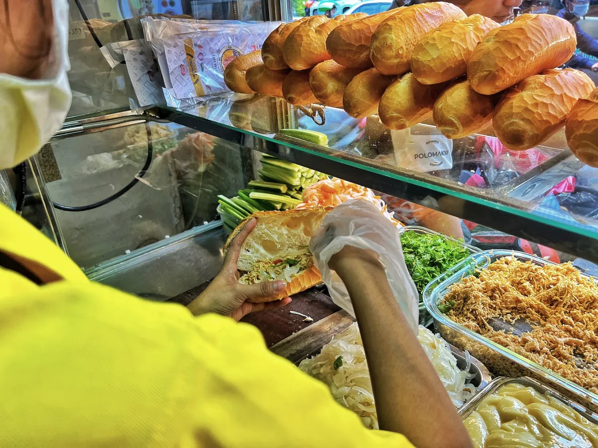 Ho Chi Minh City by Night: Our Honest Review of the Aodai Rider Street Food Tour