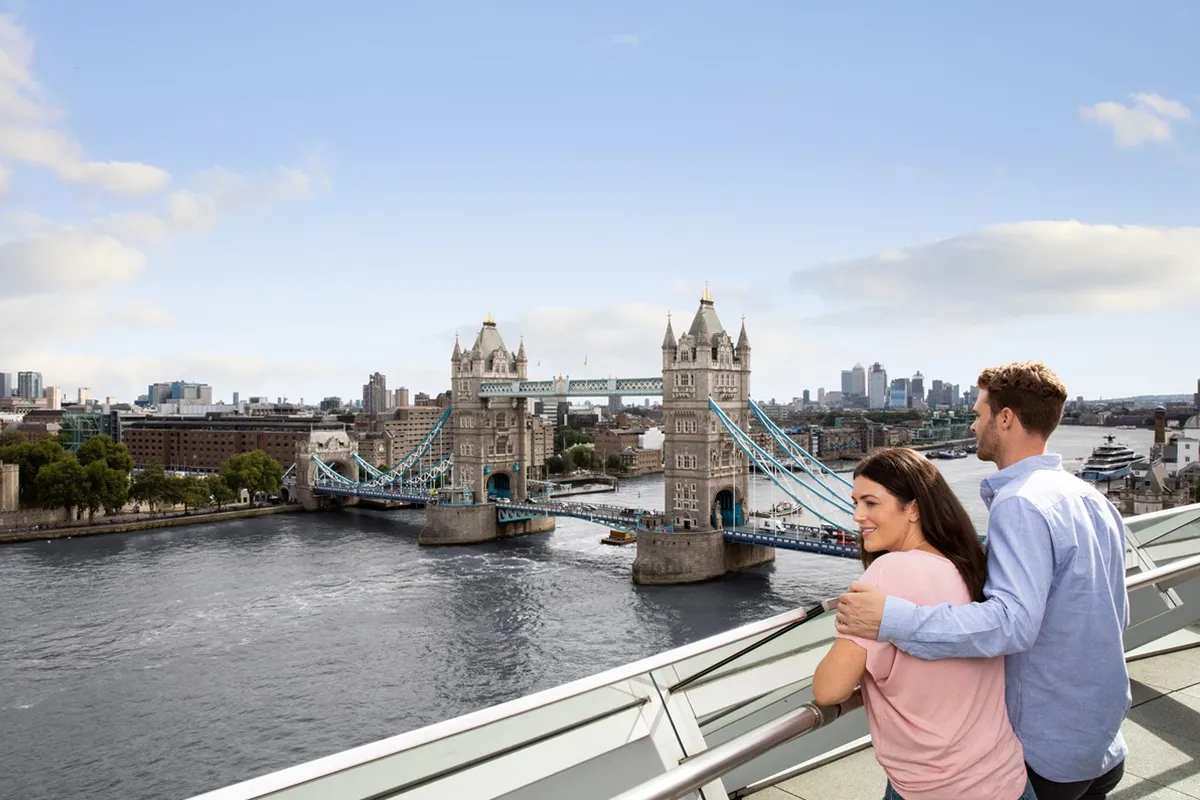 Marvel at the iconic Tower Bridge as it gracefully opens to let passing ships through, a true symbol of the city