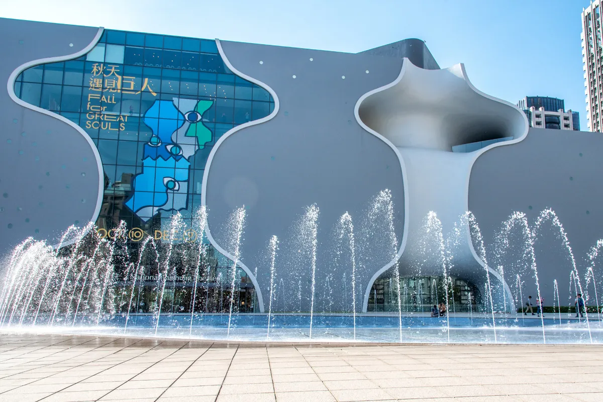 National Taichung Theater (NTT). Its innovative, flowing white curves create a visual masterpiece and a perfect, unique backdrop for photography in the city center