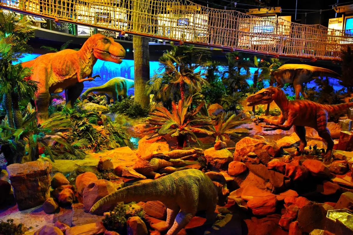 Watch a singing animatronic T-Rex and learn more about geology at the Geotime Diorama exhibit.