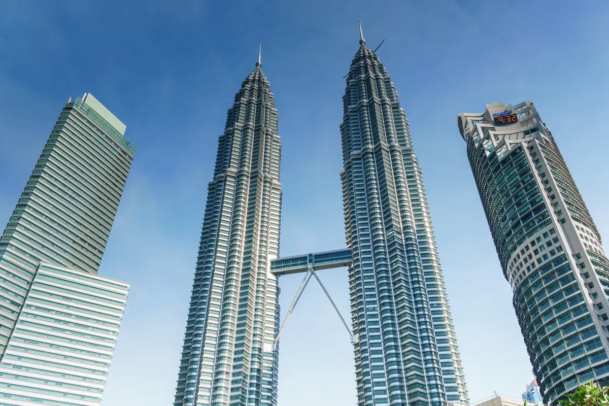 Scaling Kuala Lumpur's Sky-High Icons: An Unforgettable PETRONAS Twin Towers Adventure!