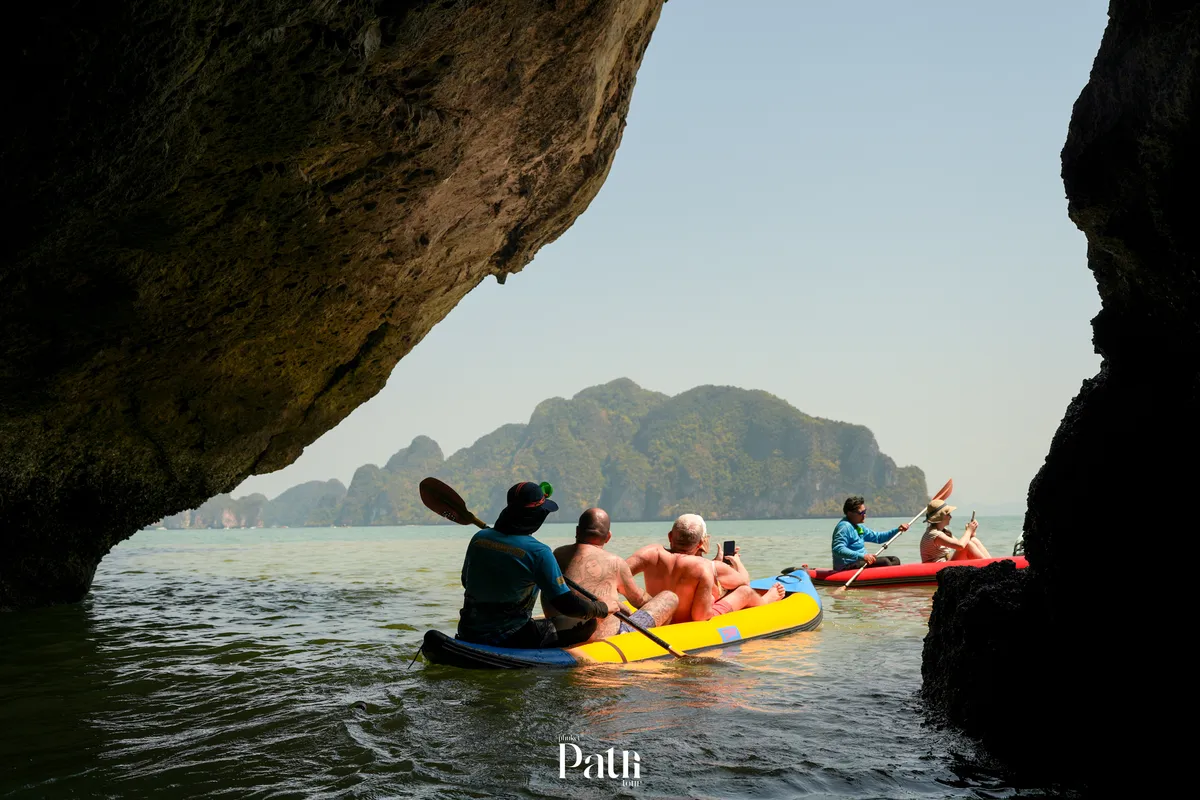 Canoeing in Phang Nga Bay , paddling through emerald waters and limestone cliffs, the serene beauty of hidden caves and quiet lagoons made the journey unforgettable.