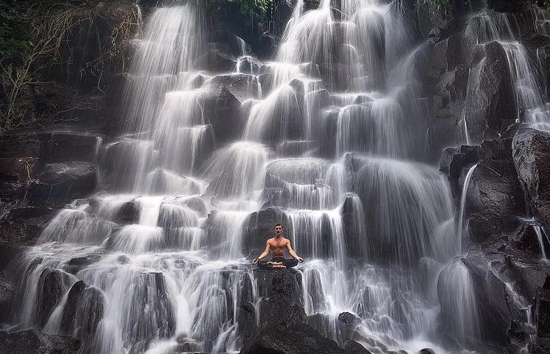 Playing with water at Kato Lampo waterfall!