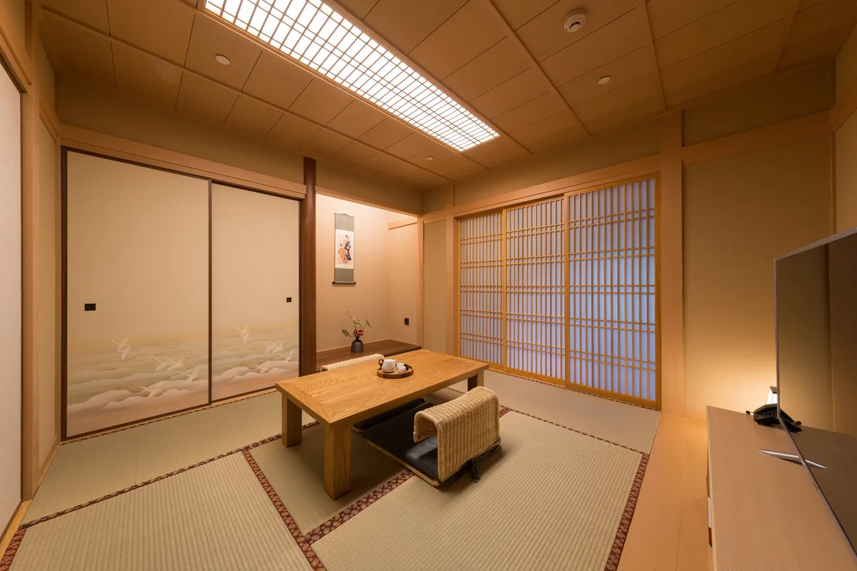 Japanese-Style Suite: Experience a Zen-inspired design. Step into a traditional tatami room in a Yukata robe and enjoy the exotic, old-world atmosphere.