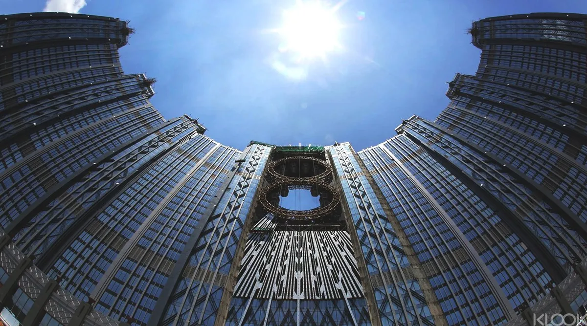Defy Gravity: Conquering Macau's Golden Reel Figure-8 Ferris Wheel!
