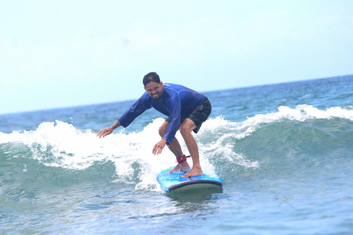 Feel the awesome rush of catching a wave in Bali.
